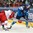 MINSK, BELARUS - MAY 24: Finland's Jori Lehtera #21 pulls the puck away from Czech Republic's Jakub Kindl #2 during semifinal round action at the 2014 IIHF Ice Hockey World Championship. (Photo by Richard Wolowicz/HHOF-IIHF Images)

